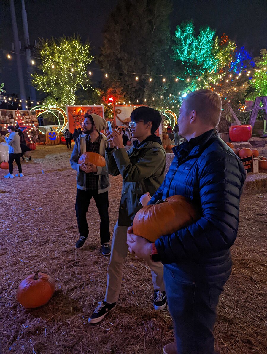 Taking pumpkins from Jack's Pumpkin Pop Up 